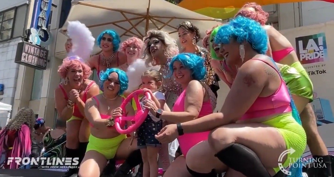 Parent Tosses Toddler Into Arms of Drag Queens That Just Finished Twerking and Spreading Their Legs in Front of Children at Pride Parade in Hollywood (VIDEO)