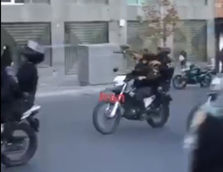 VIDEO: Iranian Regime Thugs Fire on Protesters from their Motorcycles in Tehran – Fire on Women in the Streets