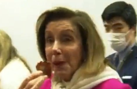 Pelosi Laughs and Eats a Chip When Asked About Biden Docs